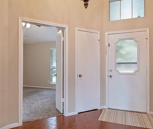 This is the view looking back at the front door. The layout of this home has the secondary bedrooms on one side with the private master retreat on the other.
