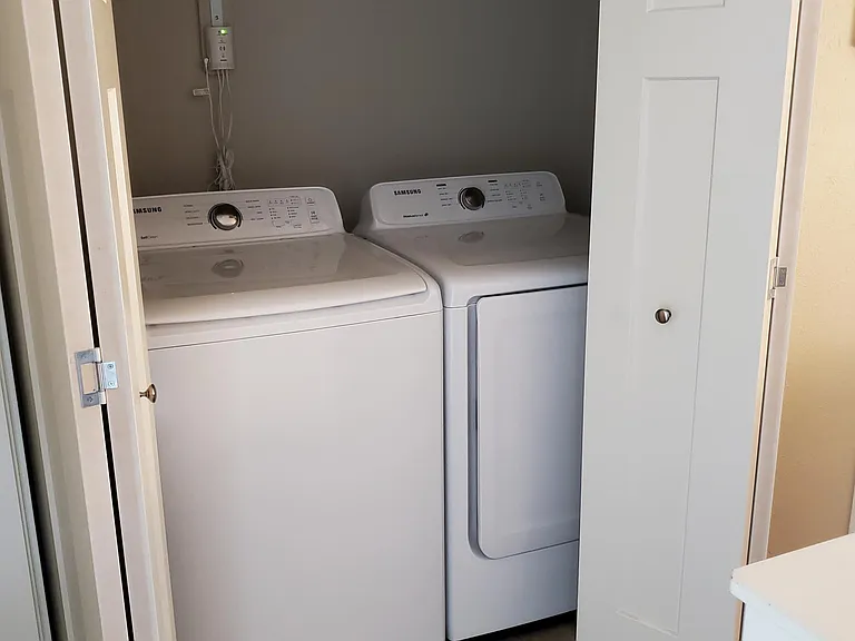 Upper level utility closet in hall. WD comes with the unit but ill not be maintained or replaced.