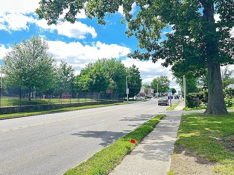 Located on a tree-lined street with sidewalks and convenient access to local shops, dining, parks, and public transportation.