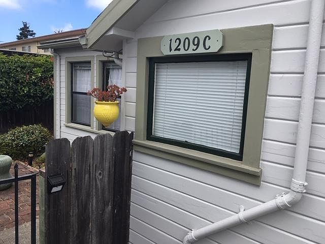 Kitchen Window / Partial Partial view of front Font Fence & Gate