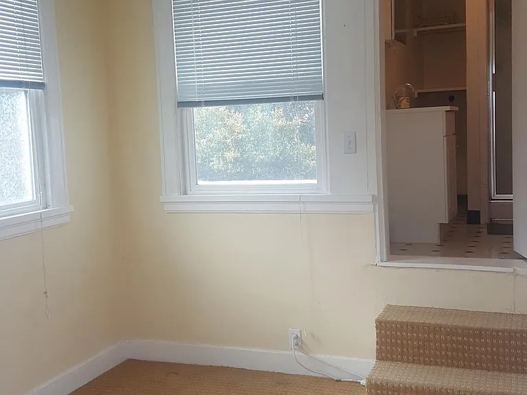 Living Area with steps to the Bathroom
