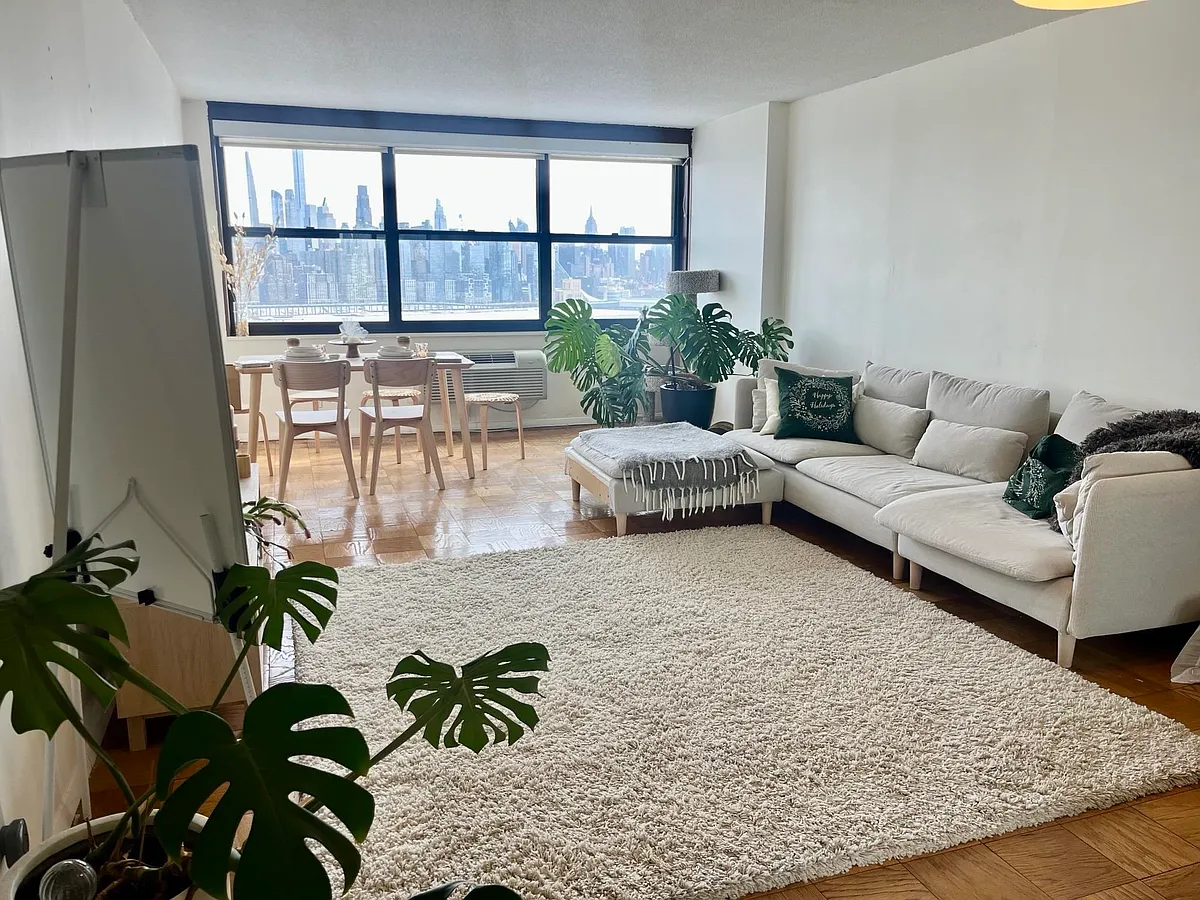 Building Photo - 7002 Boulevard East #26F
