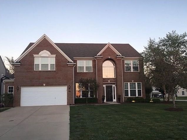 Beautiful brick on the home's front exterior. Extra space in the garage for storage. The lot has a couple of trees in both the front and back and is nestled on a spacious corner lot.