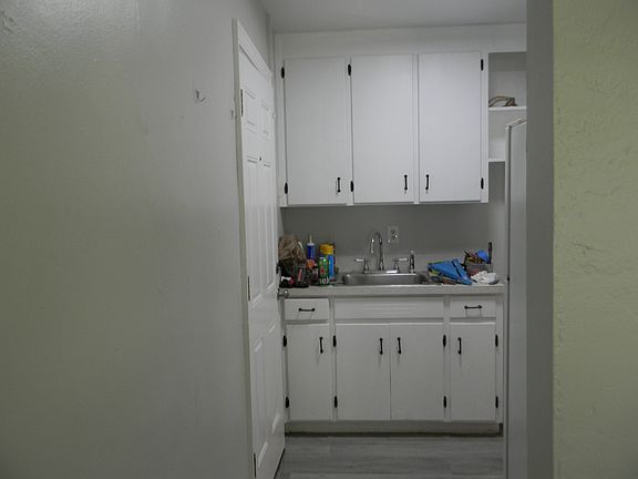 KITCHEN. BACK DOOR TO LEFT