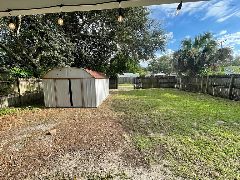 Backyard and storage shed.