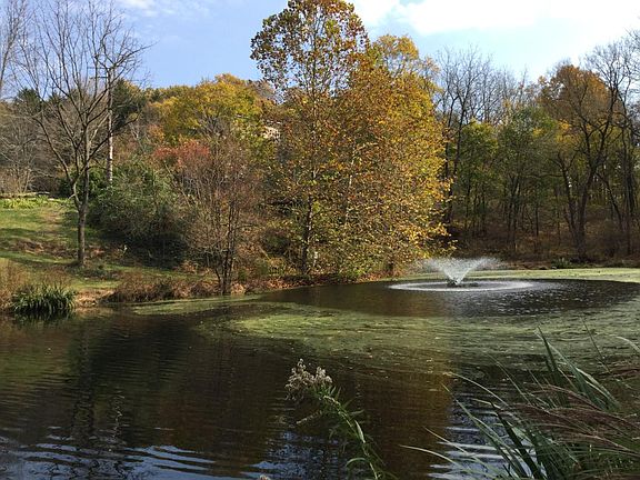 1/2 acre pond with aerator at rear of house