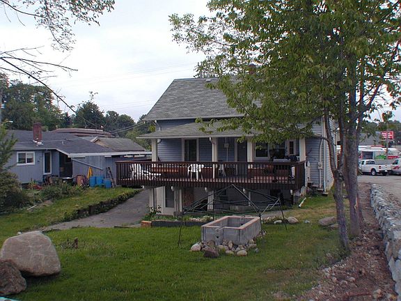 Large backyard with BBQ pit for pig
