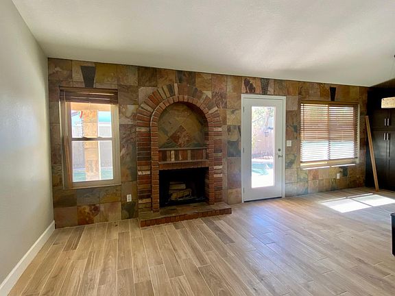 Family room with wood burning fireplace