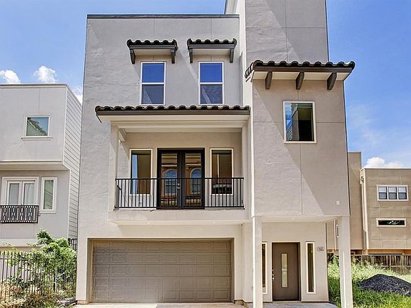 Located in Midtown - home features a balcony and roof top terrace.