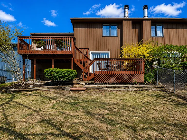 Fenced yard with double deck