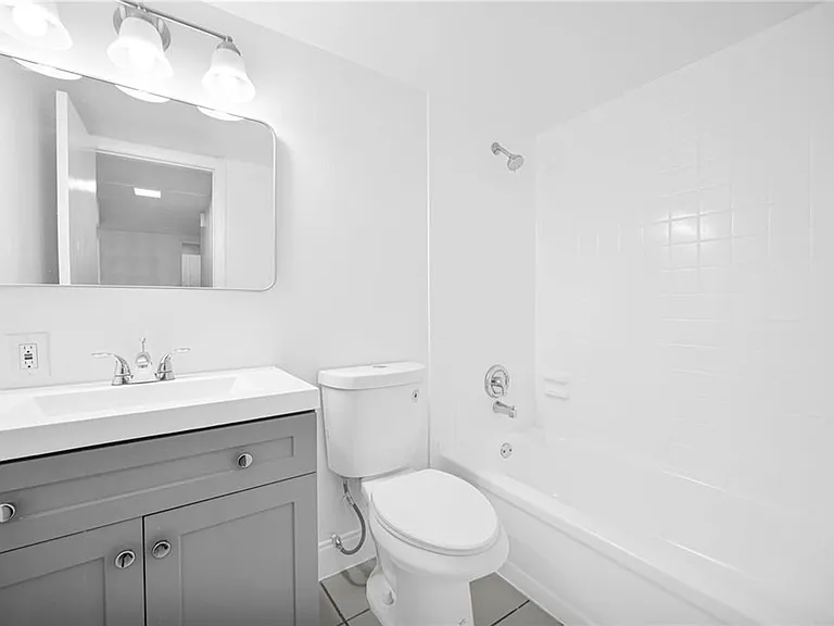 Colonial Village - 7550 Stirling Rd — Photo 11