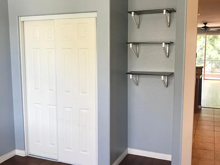 Office closet and display shelves.