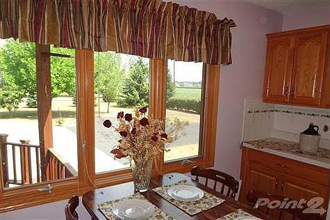 Spacious eat-in kitchen is opened to the Dining room.