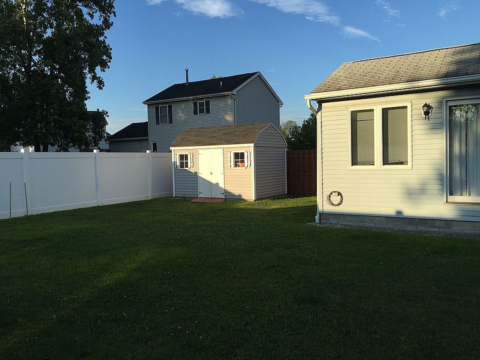 Shed and fenced back yard