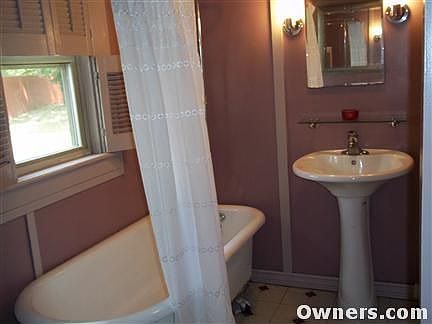 Bathroom with cast iron tub