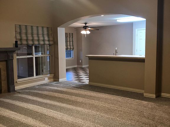 Living Room And Kitchen Looking From Front Foyer.
