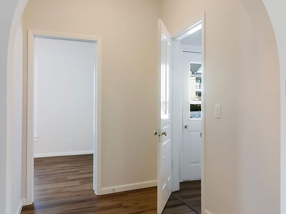 Check out this gorgeous archway in the largest unit downstairs.