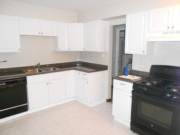 eat-in kitchen w/ pass-thru for open feel