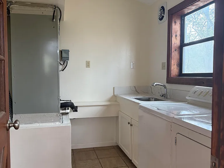 Laundry room with utility sink