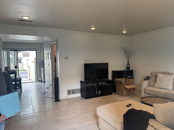 Canned lights, oversized front window. Plenty of room to entertain in this living room