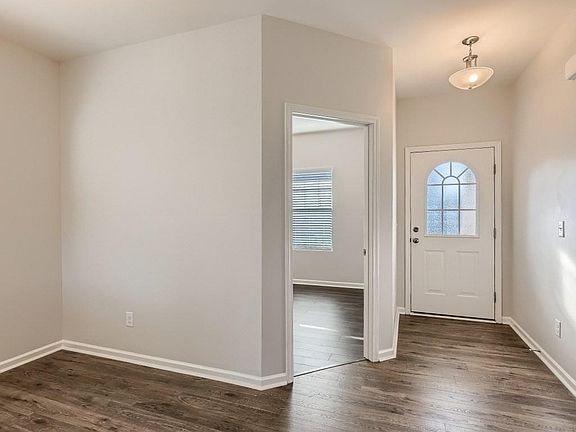 Office space with a door near the front entry.