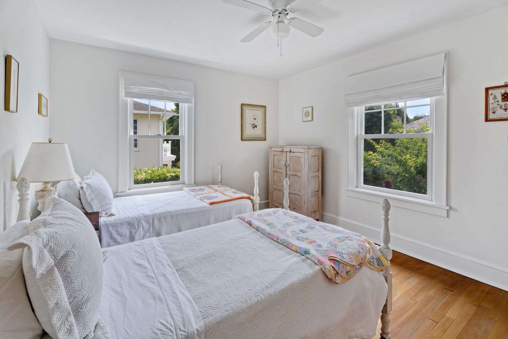 Two twin beds in one of the 4 bedrooms