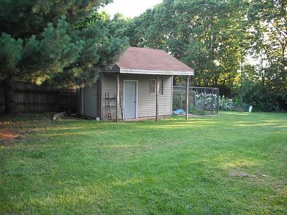 Shed to keep your toys and a dog run that stays