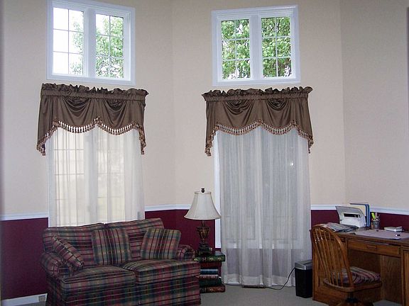 Main Floor Library w/Floor Ceiling Windows