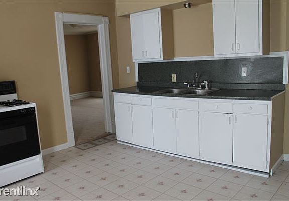VIEW OF KITCHEN FROM BACK DOOR