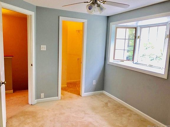 Second bedroom with walkin closet, painted white