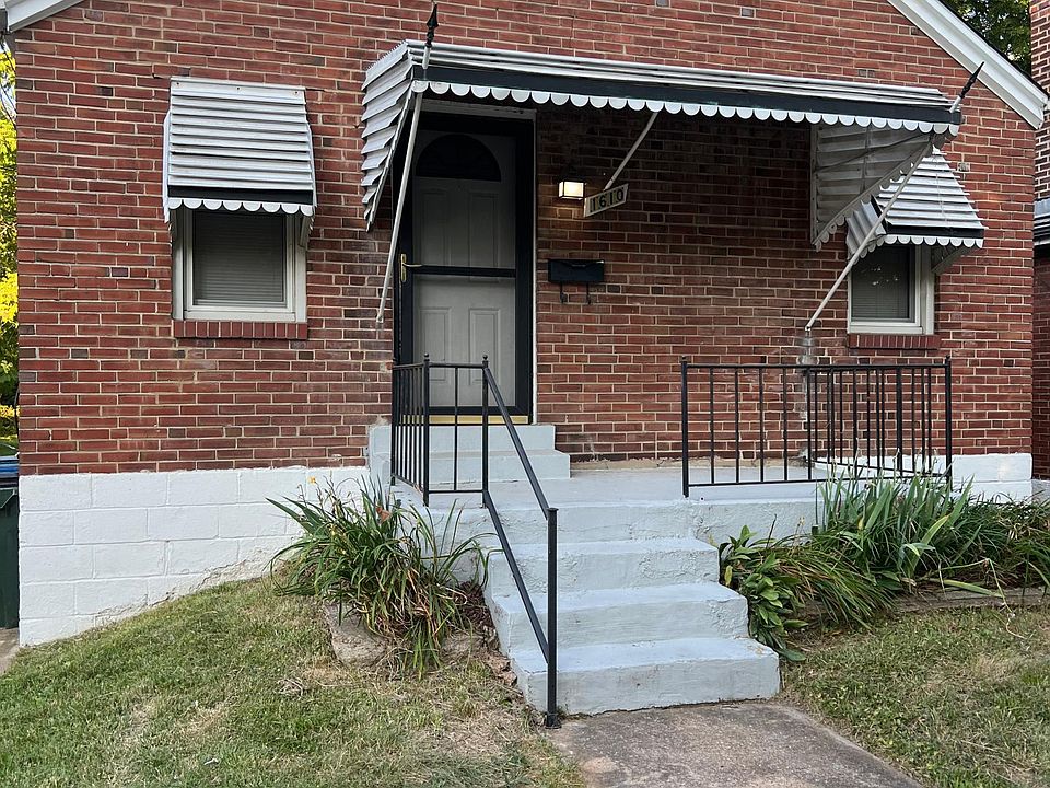 Exterior with awnings to keep utility bills low.