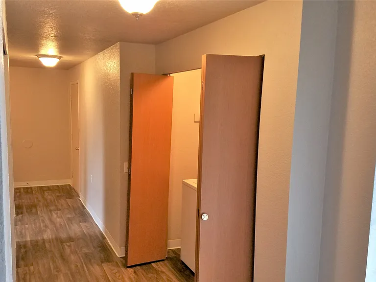 Hallway with Laundry closet close to front door