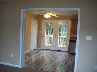 french doors to deck out back from kitchen