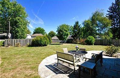 PatioEnjoy oversized/ double lot, fully fenced and surrounded by mature trees!
