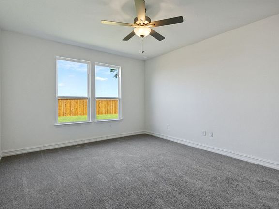 Elegant owner s suite with large windows and private bathroom model representation