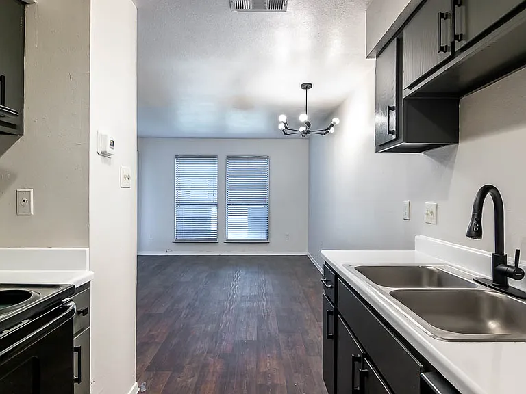 Kitchen view from our cozy 1 bed 1 bath apartments!