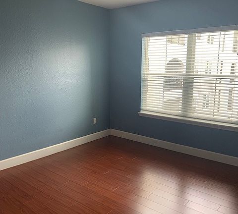 primary bedroom is large enough to fit a king size bed.