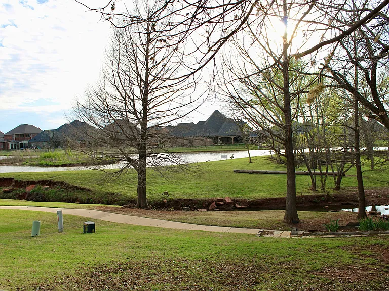 Backyard with view of pond