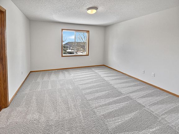 5th image of 9313 Austrianpine Ave N