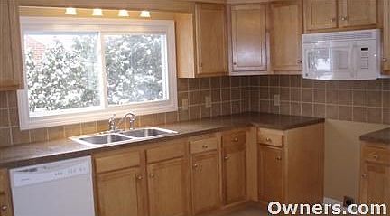 Maple kitchen, tile backsplashes