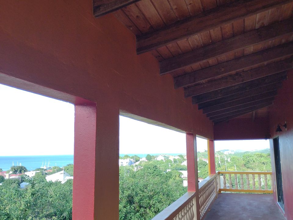 Covered Patio/Porch and Entry/Exit to Rooms