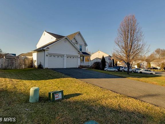 Two car garage and lots of parking on driveway