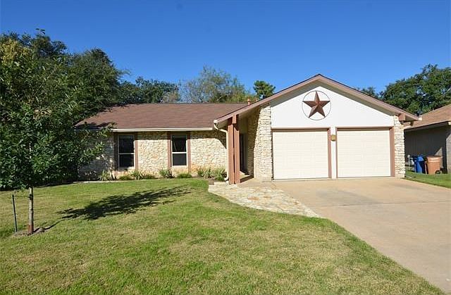 Nicely accented single story home with upgraded James Hardi siding.