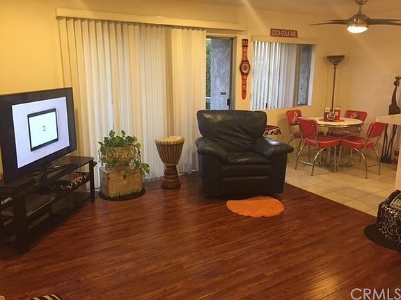 Living area with wood laminate flooring