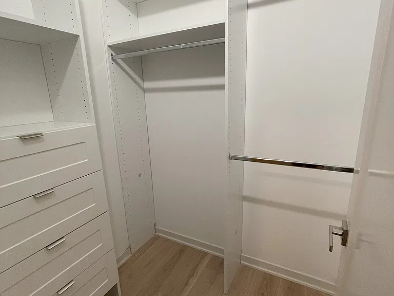 Bedroom #2's walk-in custom closet