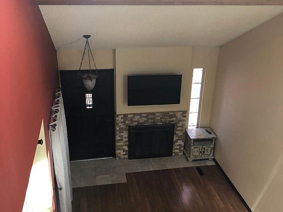 Cozy up to the wood-burning fireplace in the winter months.