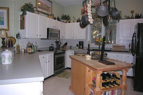 Kitchen has stainless appliances