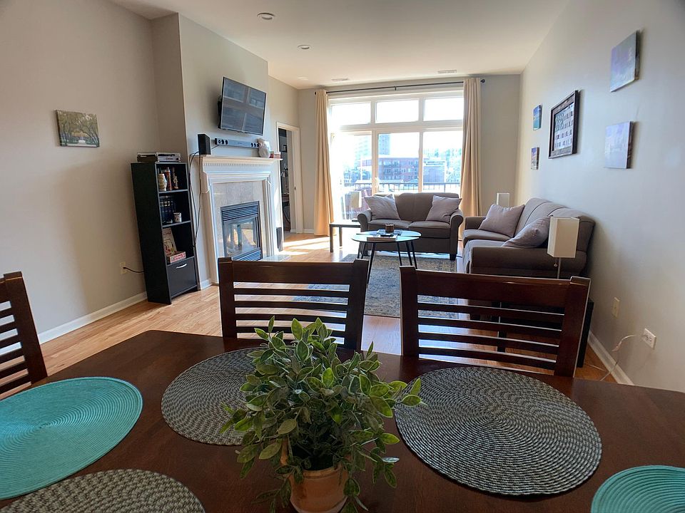 Hardwood flooring, Fireplace, large balcony high ceilings, open concept Kitchen