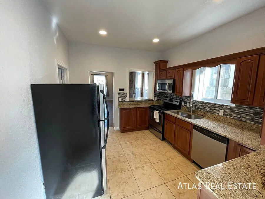 Coming Soon Historic Baker Charmer With Exposed Brick, Private Yard & 2-Car Garage — Photo 3