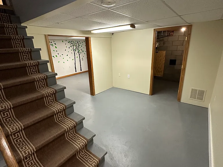 Downstairs bonus rooms, playroom, and laundry room.